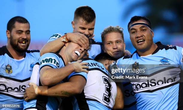 Sharks players celebrate a Valentine Holmes try during the round seven NRL match between the Cronulla Sharks and the Penrith Panthers at Southern...