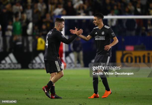 Greg Garza and Miguel Almiron of Atlanta United celebrate after their MLS match against the Los Angeles Galaxy at StubHub Center on April 21, 2018 in...