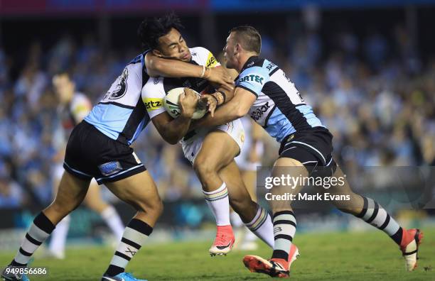 Christian Crichton of the Panthers is tackled during the round seven NRL match between the Cronulla Sharks and the Penrith Panthers at Southern Cross...