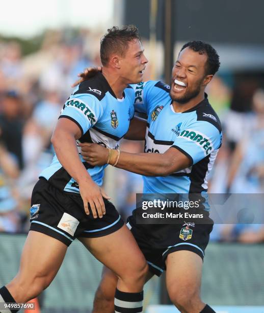 Scott Sorensen of the Sharks celebrates a try with Joseph Paulo during the round seven NRL match between the Cronulla Sharks and the Penrith Panthers...