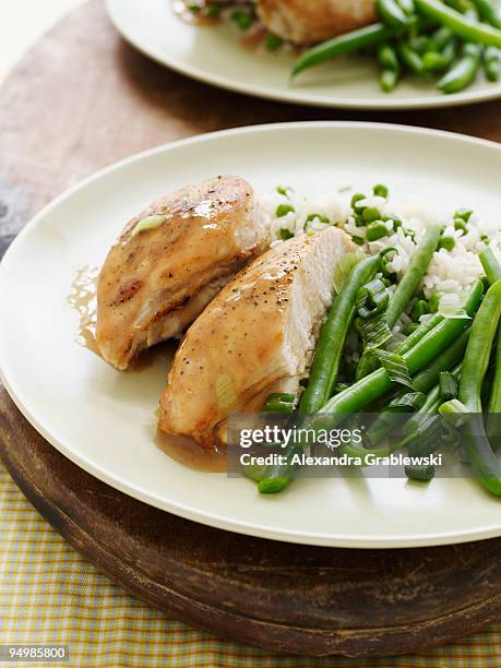 chicken breast dinner - rice plate stock pictures, royalty-free photos & images