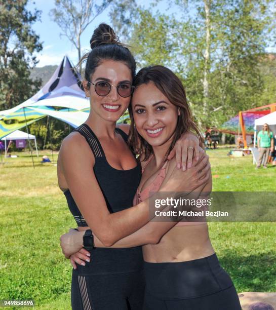 Nikki Reed and Francia Raisa attend Imagine Fest Yoga and Music Festival 2018 on April 21, 2018 in Agoura Hills, California.