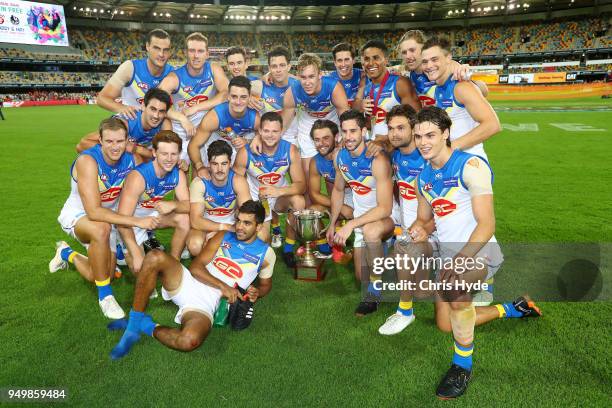 Suns celebrate winnning the Q Clash during the round five AFL match between the Brisbane Lions and the Gold Coast Suns at The Gabba on April 22, 2018...