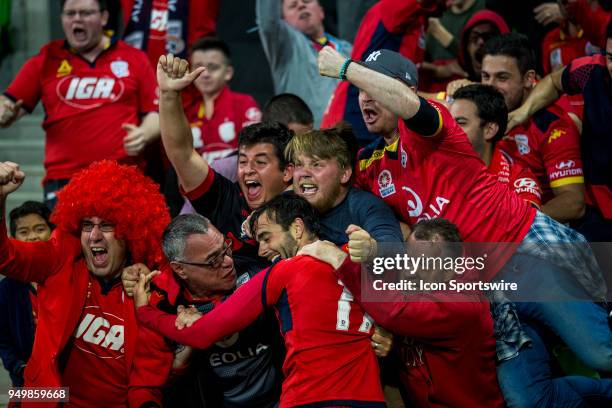 Nikola Mileusnic of Adelaide United celebrates with Adelaide United supporters after scoring a goal during the Elimination Final of the Hyundai...