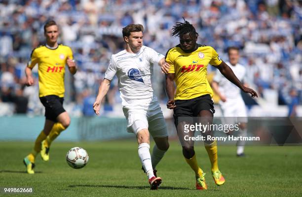 Bjoern Rother of 1. FC Magdeburg and Bernard Kyere Mensah of Fortuna Koeln compete during the 3. Liga match between 1. FC Magdeburg and SC Fortuna...