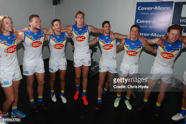 Suns sing the team song after winning the round five AFL match between the Brisbane Lions and the Gold Coast Suns at The Gabba on April 22, 2018 in...