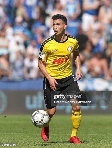 Okan Kurt of Fortuna Koeln runs with the ball during the 3. Liga match between 1. FC Magdeburg and SC Fortuna Koeln at MDCC-Arena on April 21, 2018...