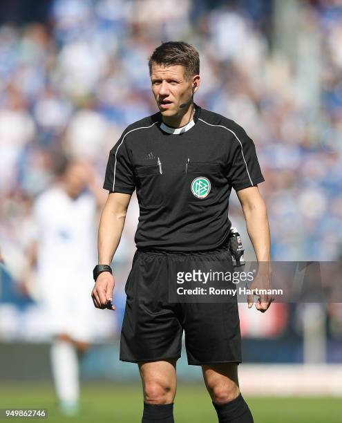 Referee Patrick Ittrich looks on during the 3. Liga match between 1. FC Magdeburg and SC Fortuna Koeln at MDCC-Arena on April 21, 2018 in Magdeburg,...