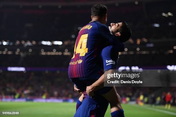 Luis Suarez of FC Barcelona celebrates with Philippe Coutinho after scoring their opening goal during the Spanish Copa del Rey Final match between...