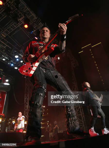 Singer Ivan Moody guitarists Jason Hook and Zoltan Bathory of Five Finger Death Punch perform during the Las Rageous music festival at the Downtown...