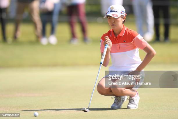 Karen Gondo of Japan lines up her putt on the 2nd hole during the final round of the Fuji Sankei Ladies Classic at Kawana Hotel Golf Course Fuji...
