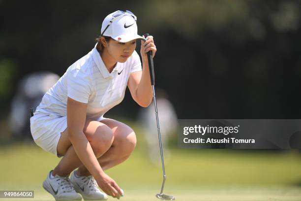 Rumi Yoshiba of Japan lines up her putt on the 10th green during the final round of the Fuji Sankei Ladies Classic at Kawana Hotel Golf Course Fuji...