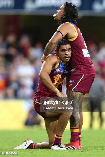 Charlie Cameron and Allen Christensen of the Lions react after losing the round five AFL match between the Brisbane Lions and the Gold Coast Suns at...