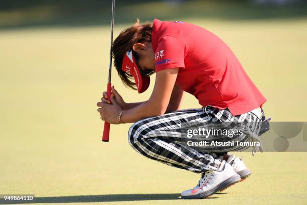 Misuzu Narita of Japan reacts after missing her birdie putt on the 18th hole during the final round of the Fuji Sankei Ladies Classic at Kawana Hotel...