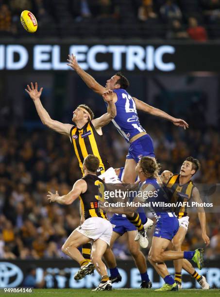 Ben McEvoy of the Hawks and Todd Goldstein of the Kangaroos compete for the ball during the 2018 AFL round five match between the North Melbourne...