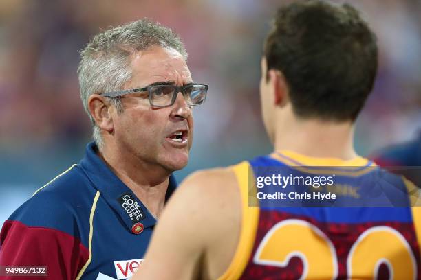 Lions coach Chris Fagan talks to players during the round five AFL match between the Brisbane Lions and the Gold Coast Suns at The Gabba on April 22,...