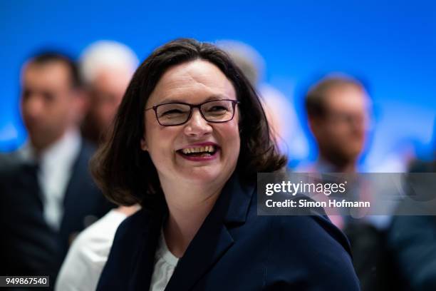 Andrea Nahles smiles on her arrival during the SPD federal party congress on April 22, 2018 in Wiesbaden, Germany. Delegates will vote on a new party...