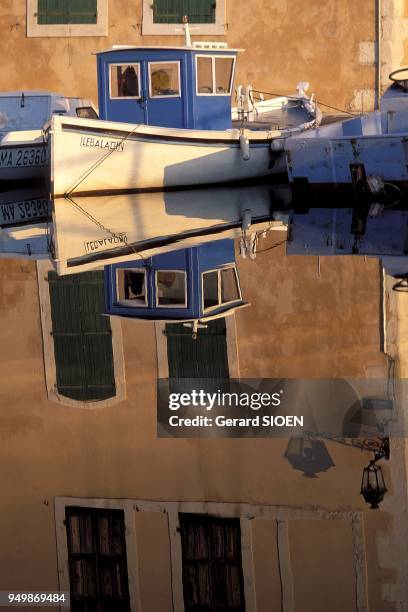 Martigues village known by the nickname Venice of Provence. It nestles on the shores of the Etang de Berre and the Caronte Canal. Atmosphere on the...