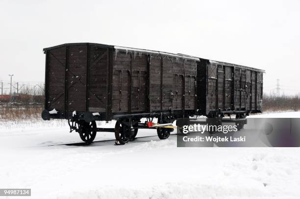 An original carriage used by Nazi Germans to transport people stays on railway platform 1 km from Auschwitz II-Birkenau extermination camp on...