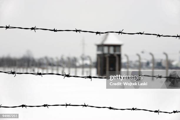 The barbed wire encloses the Auschwitz II-Birkenau extermination camp on December 17, 2009 in Brzezinka, Poland. Auschwitz was a network of...