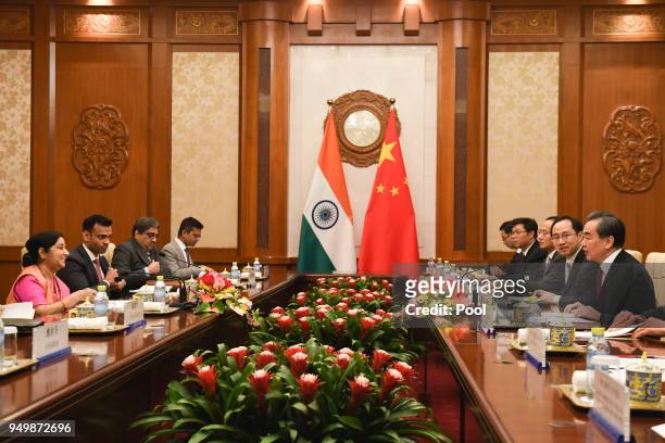 Indian Foreign Minister Sushma Swaraj and Chinese Forein Minister Wang Yi have a meeting at the Diaoyutai State Guest House on April 22, 2018 in...