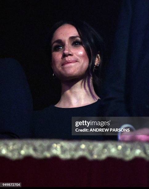 Actress and fiancee of Britain's Prince Harry Meghan Markle attends The Queen's Birthday Party concert on the occassion of Her Majesty's 92nd...