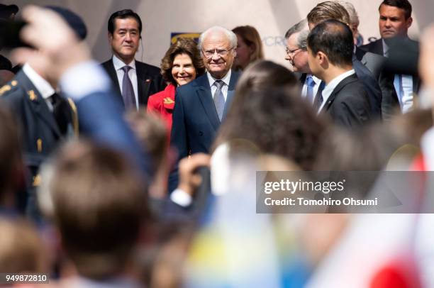 King Carl XVI Gustaf of Sweden, center right, and Queen Silvia of Sweden, center left, arrive for an event at the Embassy of Sweden on April 22, 2018...