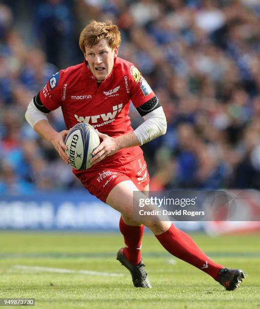 Rhys Patchell of the Scarlets runs with the ball during the European Rugby Champions Cup Semi-Final match between Leinster Rugby and Scarlets at...