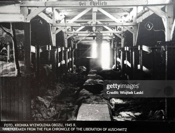 An original photo of bunk beds in Auschwitz II-Birkenau extermination camp on December 17, 2009 in Brzezinka, Poland. Auschwitz was a network of...