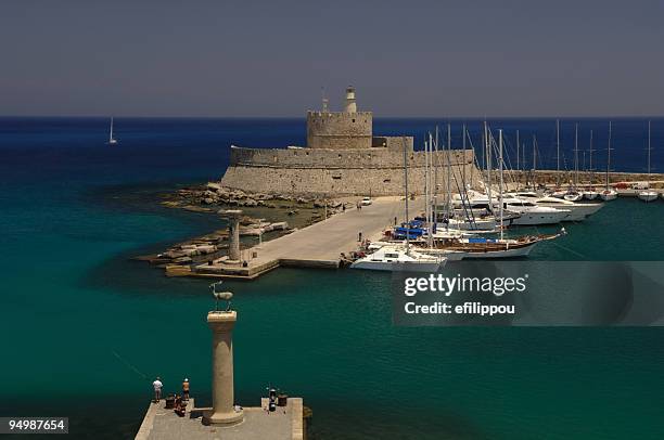 rhodes mandraki port entry - ferry terminal stock pictures, royalty-free photos & images