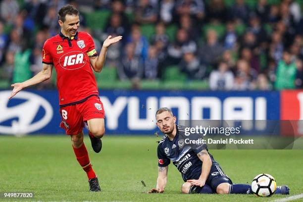 Isaas of Adelaide United gestures to James Troisi of the Victory after he falls over during the A-League Elimination Final match between Melbourne...