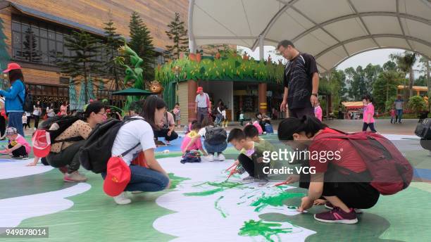 Children paint a huge earth painting to celebrate the Earth Day on April 22, 2018 in Foshan, Guangdong Province of China. Nearly 2,000 people from...
