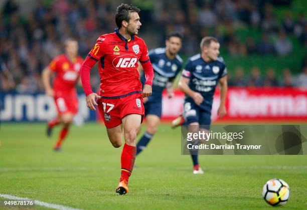Nikola Mileusnic of Adelaide United runs with the ball during the A-League Elimination Final match between Melbourne Victory and Adelaide United at...