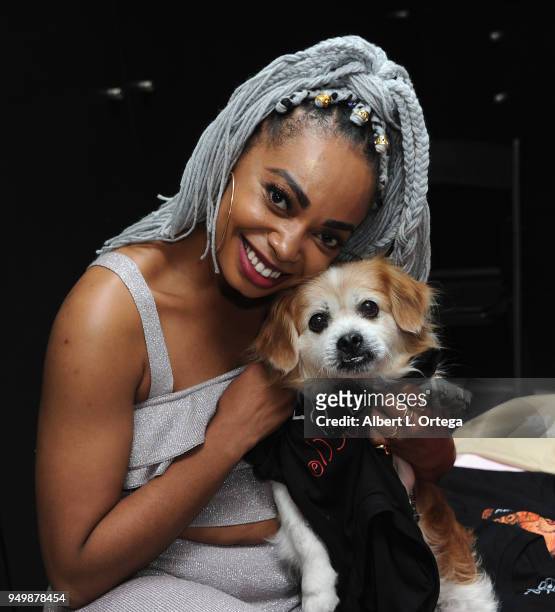 Tiara Monet poses with Mickey for Brand Bash Canine's And Cocktails To Benefit The Little Red Dog held at Sowden House on April 21, 2018 in Los...