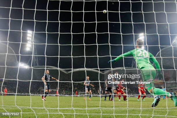 Victory goalkeeper Lawrence Thomas makes a save during the A-League Elimination Final match between Melbourne Victory and Adelaide United at AAMI...