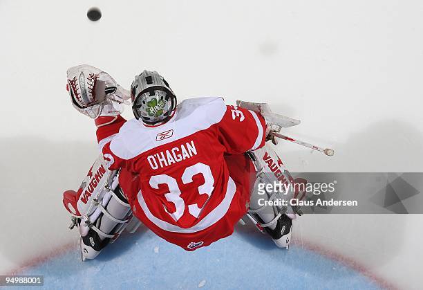 Bryce O'Hagen of the Sault Ste. Marie Greyhounds stops a shot in warm-up prior to a game against the London Knights on December 18, 2009 at the John...