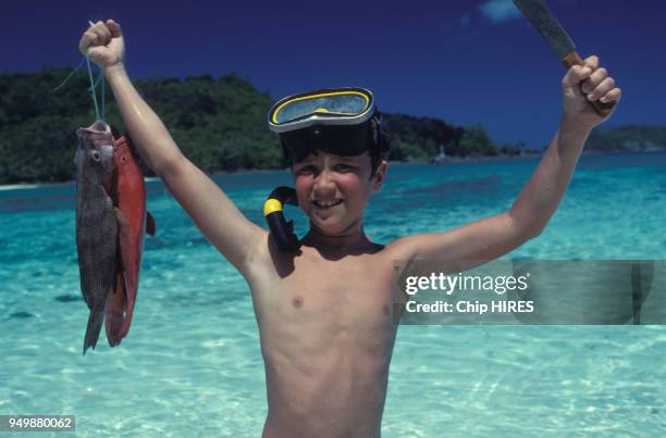 Alexandre, fils de Claude Brassseur, en vacances aux Seychelles en avril 1981.