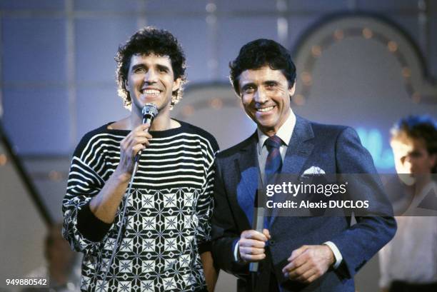 Julien Clerc à l'émission 'La belle vie' avec Sacha Distel le 12 avril 1985, Paris, France.