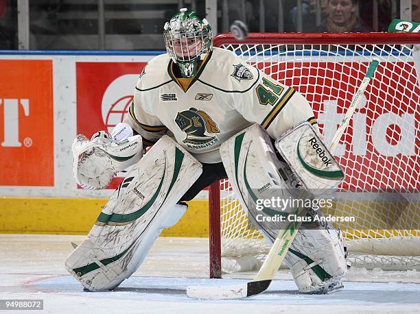 Michael Hutchinson of the London Knights keeps his eye on an incoming puck in a game against the Sault Ste. Marie Greyhounds on December 18, 2009 at...