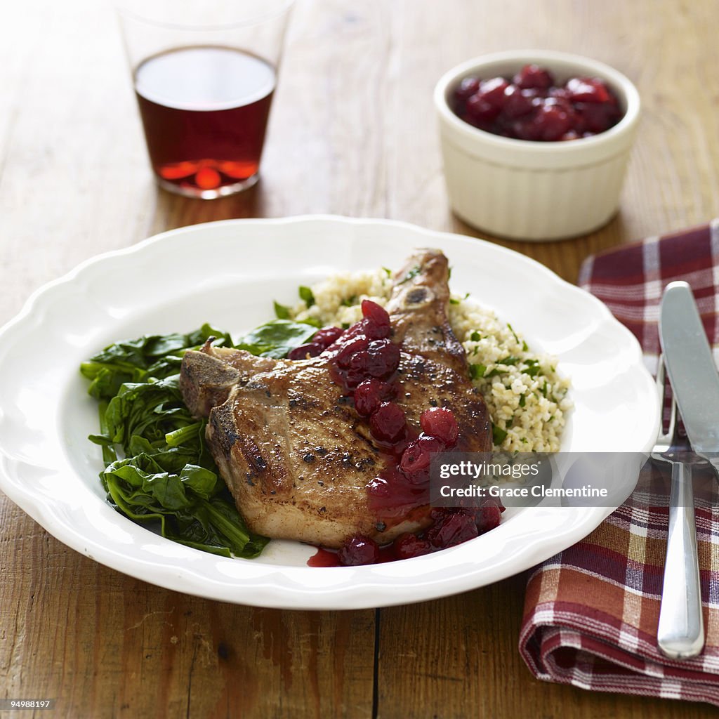 Pork chop with cranberry-balsamic sauce