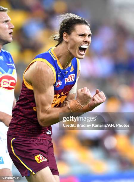 Eric Hipwood of the Lions celebrates after kicking a goal during the round five AFL match between the Brisbane Lions and the Gold Coast Suns at The...