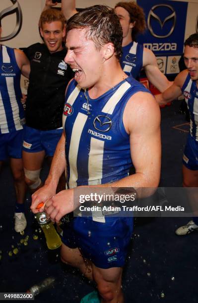 Cameron Zurhaar of the Kangaroos gets a gatorade shower after his first win during the 2018 AFL round five match between the North Melbourne...