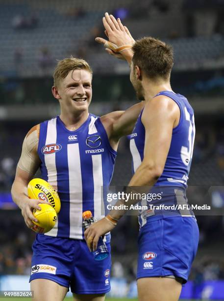 Jack Ziebell of the Kangaroos celebrates with Jamie Macmillan of the Kangaroos during the 2018 AFL round five match between the North Melbourne...