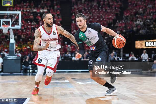 Dee Bost of Strasbourg and Trenton Meacham of Boulazac during the French Final Cup match between Strasbourg and Boulazac at AccorHotels Arena on...