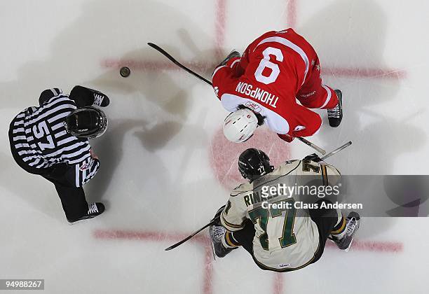 Brett Thompson of the Sault Ste. Marie Greyhounds takes a faceoff against Zac Rinaldo of the London Knights in a game on December 18, 2009 at the...