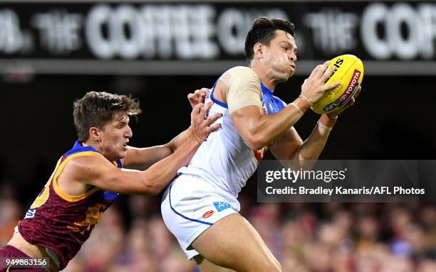 Jesse Lonergan of the Suns takes a mark during the round five AFL match between the Brisbane Lions and the Gold Coast Suns at The Gabba on April 22,...