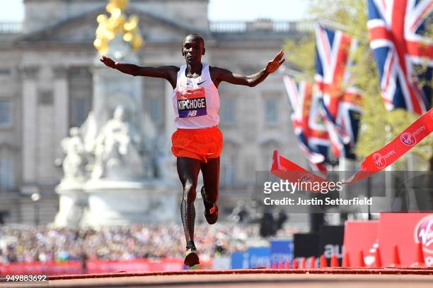 Eliud Kipchoge of Kenya crosses the finish line to win the men's race during the Virgin Money London Marathon at United Kingdom on April 22, 2018 in...