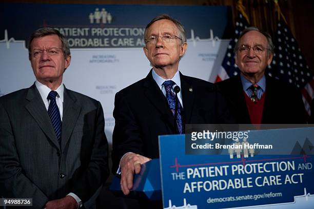 Sen. Max Baucus , Senate Majority Leader Harry Reid , and Sen. Tom Harkin speak at a news conference on health insurance reform legislation on...