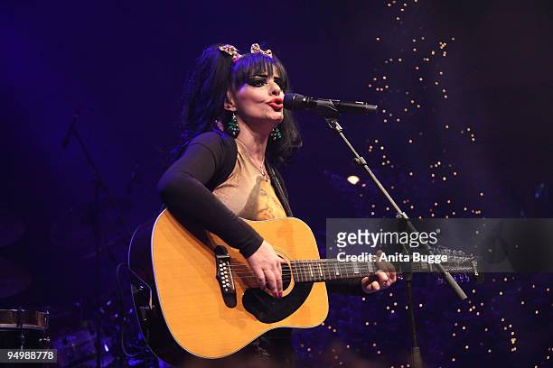 Singer Nina Hagen performs live on stage unplugged christmas caroles during a Homeless Charity Dinner on December 21, 2009 in Berlin, Germany.