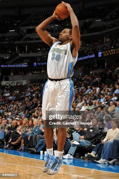 Malik Allen of the Denver Nuggets shoots against the Golden State Warriors during the game on December 1, 2009 at the Pepsi Center in Denver,...